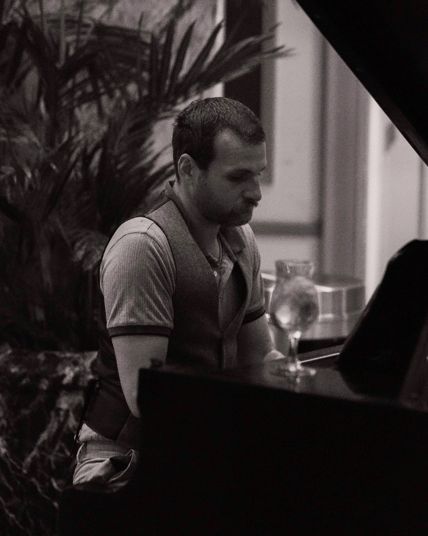 Randy Bryan Moore seated at a piano