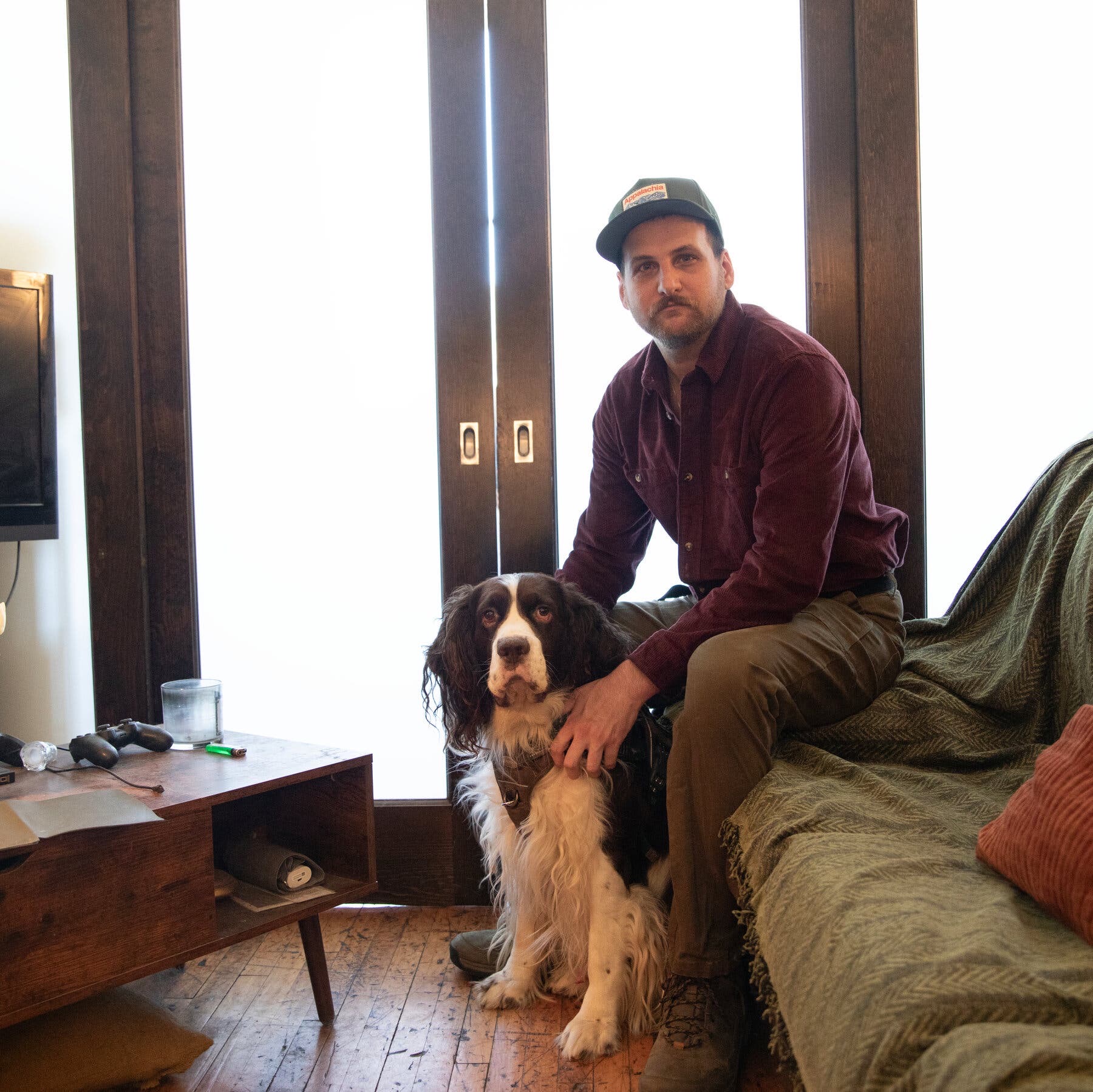 Randy Bryan Moore sitting at home with Boyd